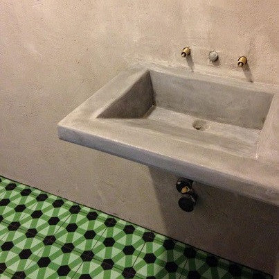 Bold Cement Tile Colors Make Bistro's Bathroom Pop