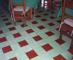 Red and White Plain Cement Tile Make Quaint Restaurant Setting