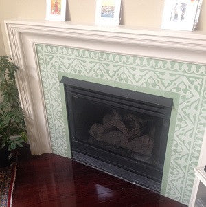 Cement Tile Border in Pale Greens Light-Up a Fireplace