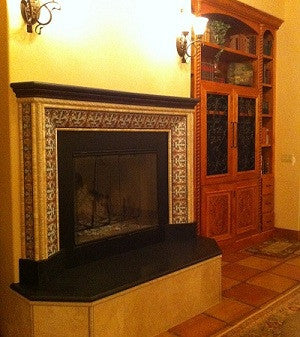 Spanish Tiles Create Border for Fireplace