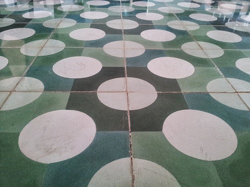 Custom Cement Tile Pattern Creates Contemporary Clubhouse Charm