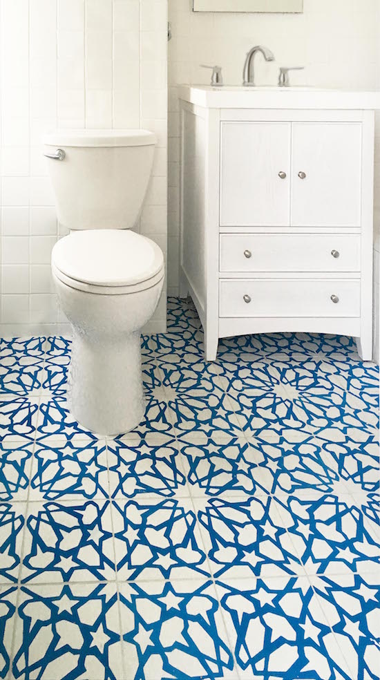 Avente's Classic Alhambra B cement tile in white and blue add color and charm to the bathroom floor